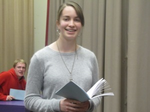 Kyra breaks character and shows how happy she is to be in the play.